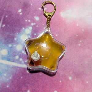 Star-Shaped Keychain with Orange Liquid